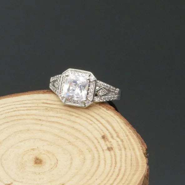 Platinum colour geometric women's ring with hollow design and inlaid zircon stones