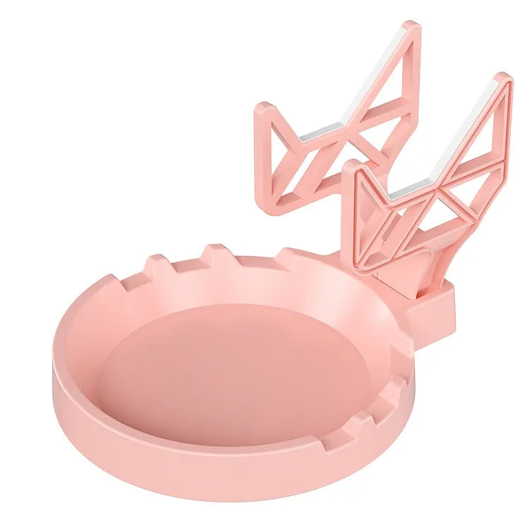 Black ABS plastic universal wall hanging rack for game controllers and headphones with adhesive glue.
