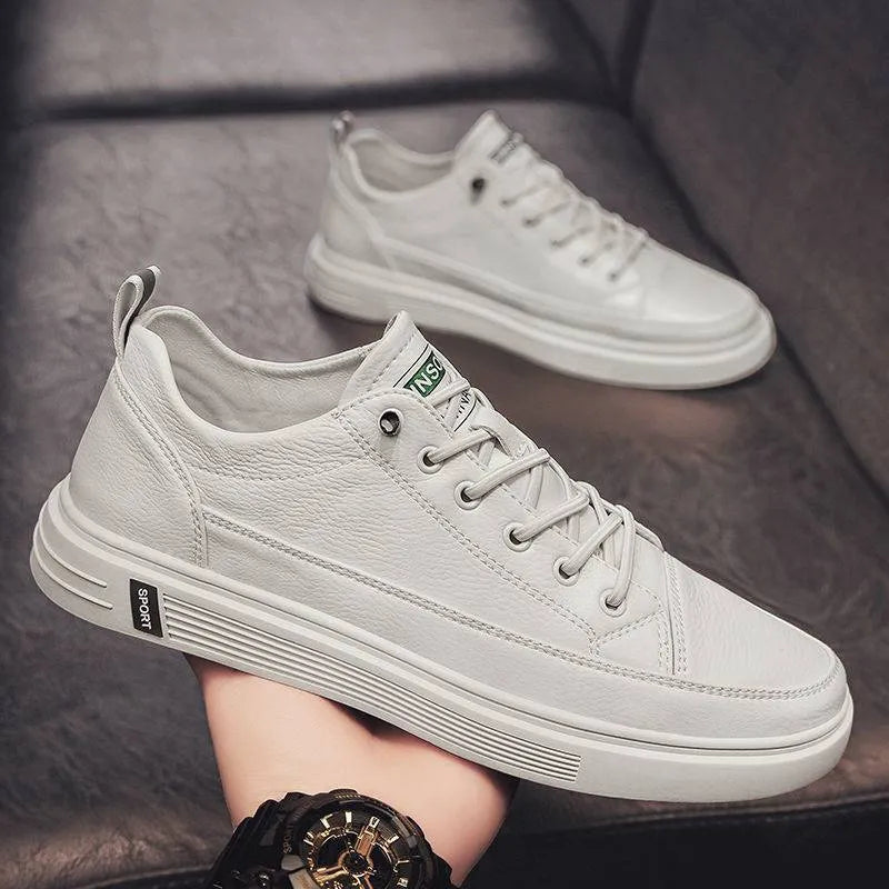 Men's white casual shoes with round toe and low heel on a flat breathable sole