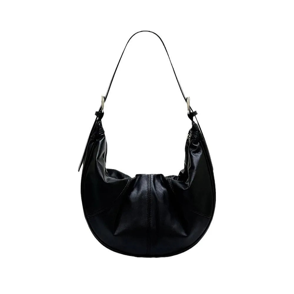 Women's genuine leather shoulder bag with dumpling shape and cowhide texture in black colour