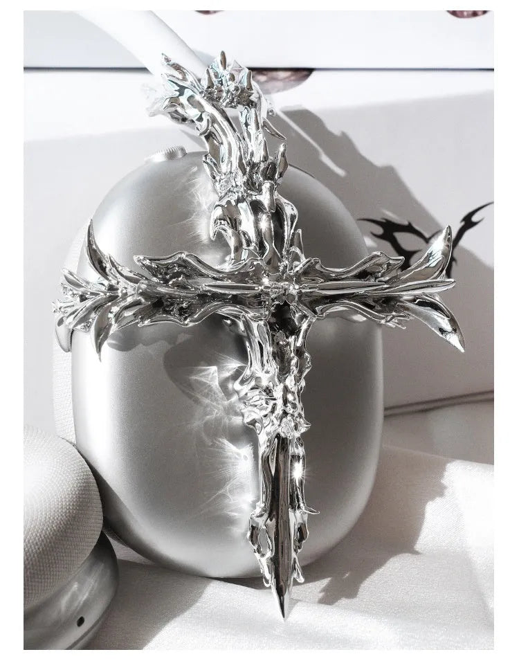 Gothic cross design hard resin cover for Apple AirPods Max headphones in gunmetal colour.