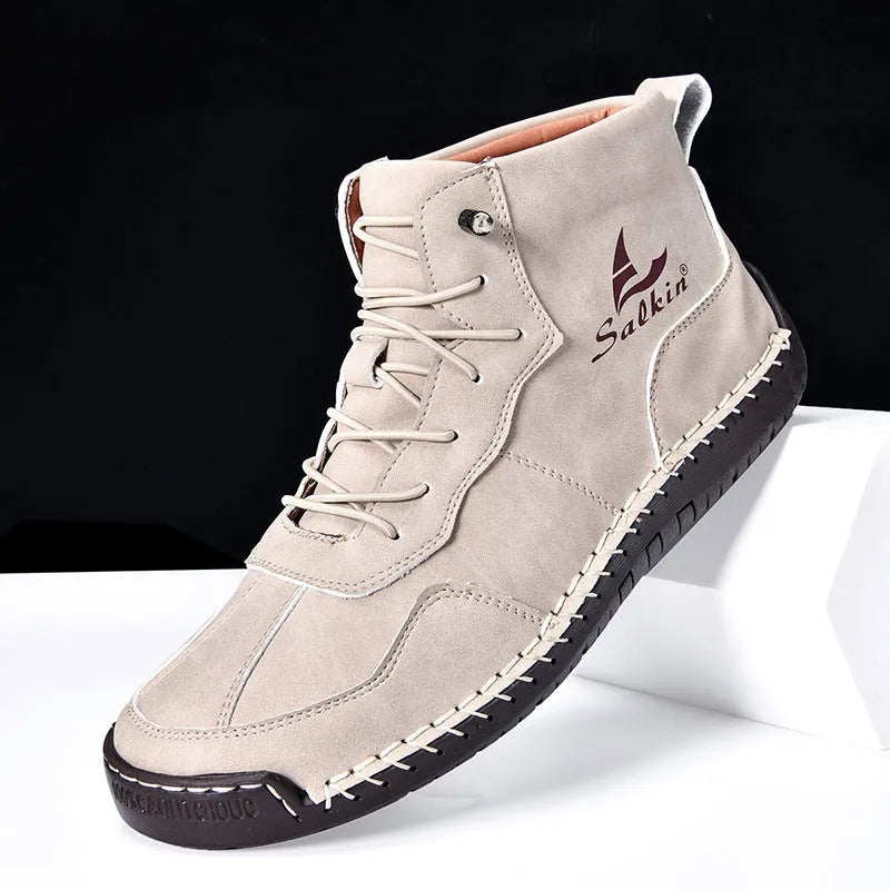 Men's high-top retro ankle boots in beige with elastic band closure and sewing line details