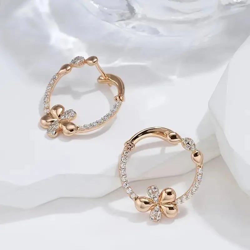 A pair of women's round silver hoop earrings made from electroplated copper.