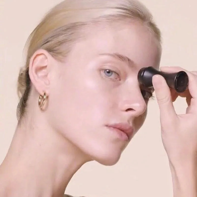 Volcanic stone facial roller for oily skin control in black, green, pink, or white colours