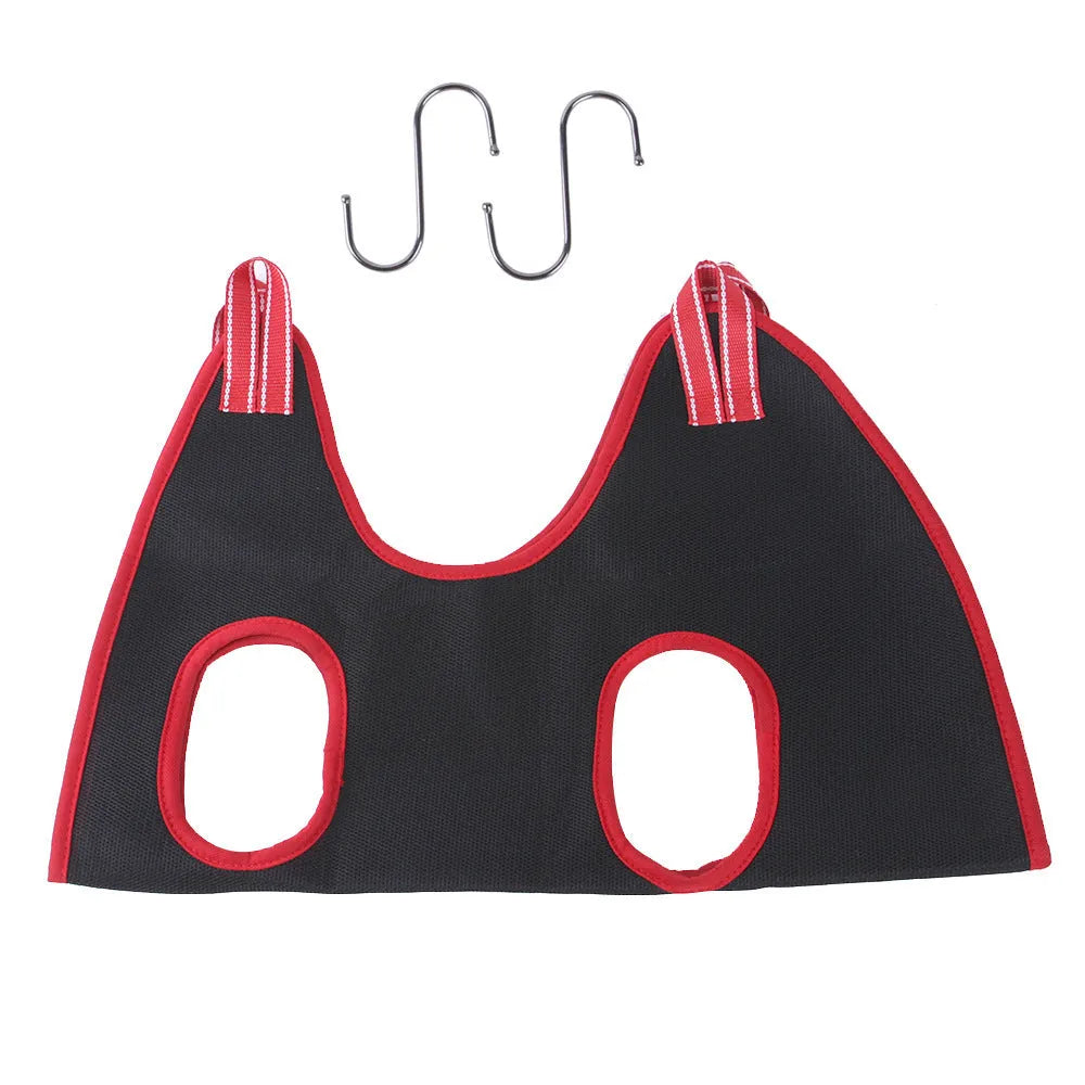 A suspended nylon mesh pet grooming hammock with a top zipper, hanging from its adjustable strap.