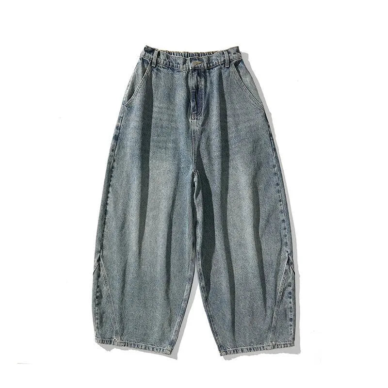 Men's plus size baggy jeans in dark blue denim with a straight leg opening and low waist.