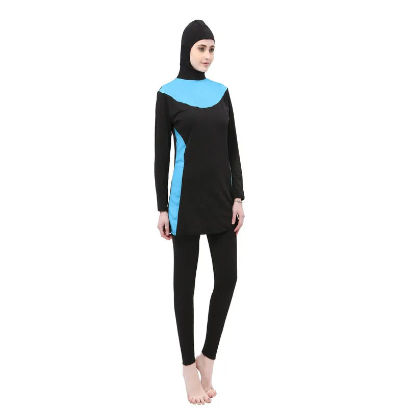 Women's long-sleeve hooded swimsuit in black with coloured trim for swimming