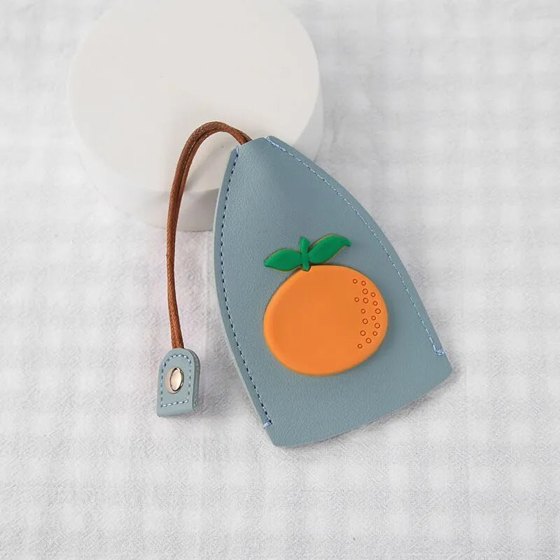 Cartoon PU leather pull-out car key case measuring 14 x 7.5cm with colourful designs