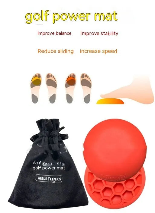 Orange golf training mat with rubber centre disc on practice surface