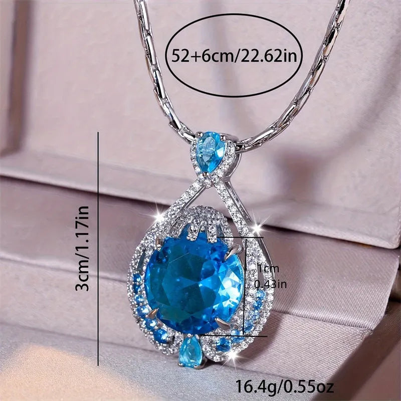 Blue fireworks cut gem geometric pendant necklace with water wave chain on woman