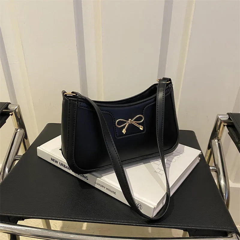 Western-style baguette shoulder bag in PU leather with bow detail, 24cm wide