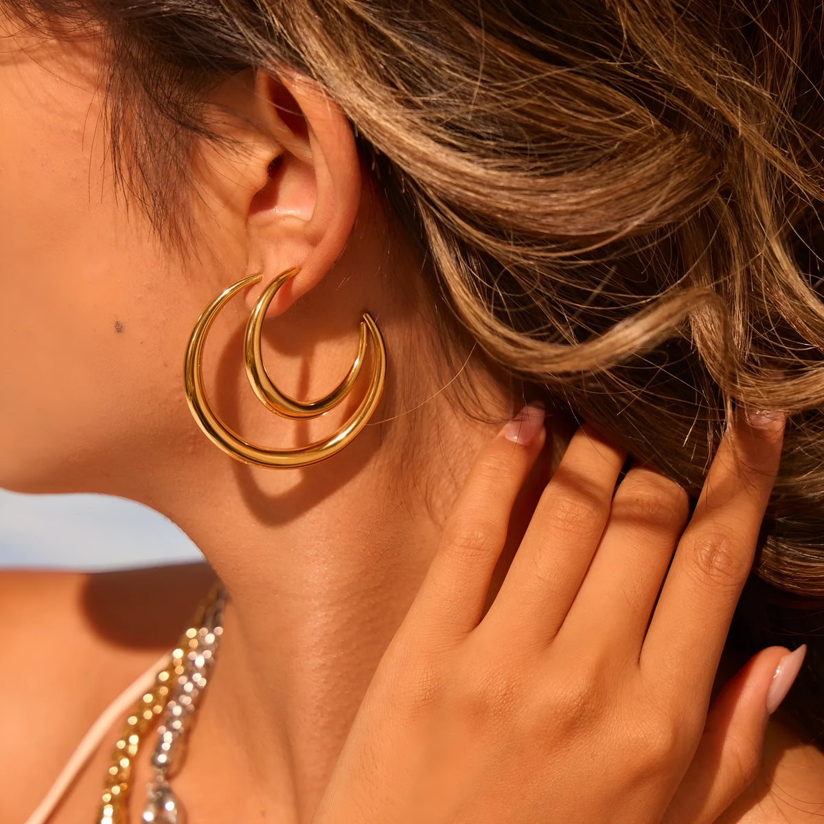 Titanium steel geometric circular hoop earrings with 18K gold plating in large or small sizes