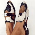 Women's black and white apricot imitation horse hair patterned retro pointed-toe low heel shoes.