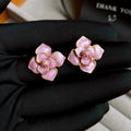 Golden-purple flower stud earrings with oil-spot glaze on copper
