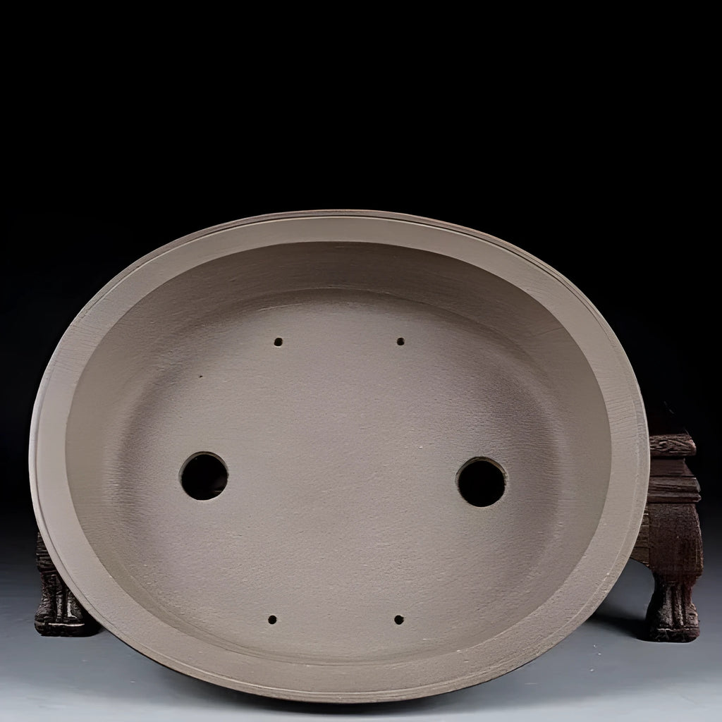 Handmade antique oval bonsai flower pot in purple sand clay, showing dimensions.