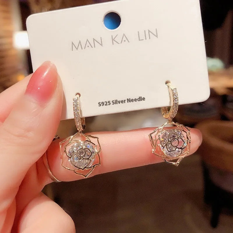 Copper geometric earrings with zircon stones and electroplated rose detail in various colour options for women