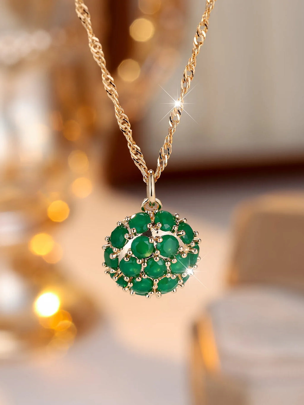 Round geometric emerald diamond necklace with champagne gold finish and adjustable chain