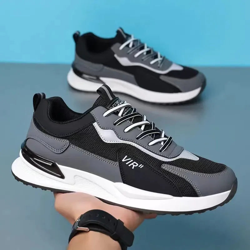 Men's colour block mesh sneakers in grey with lace-up closure and low-top design.