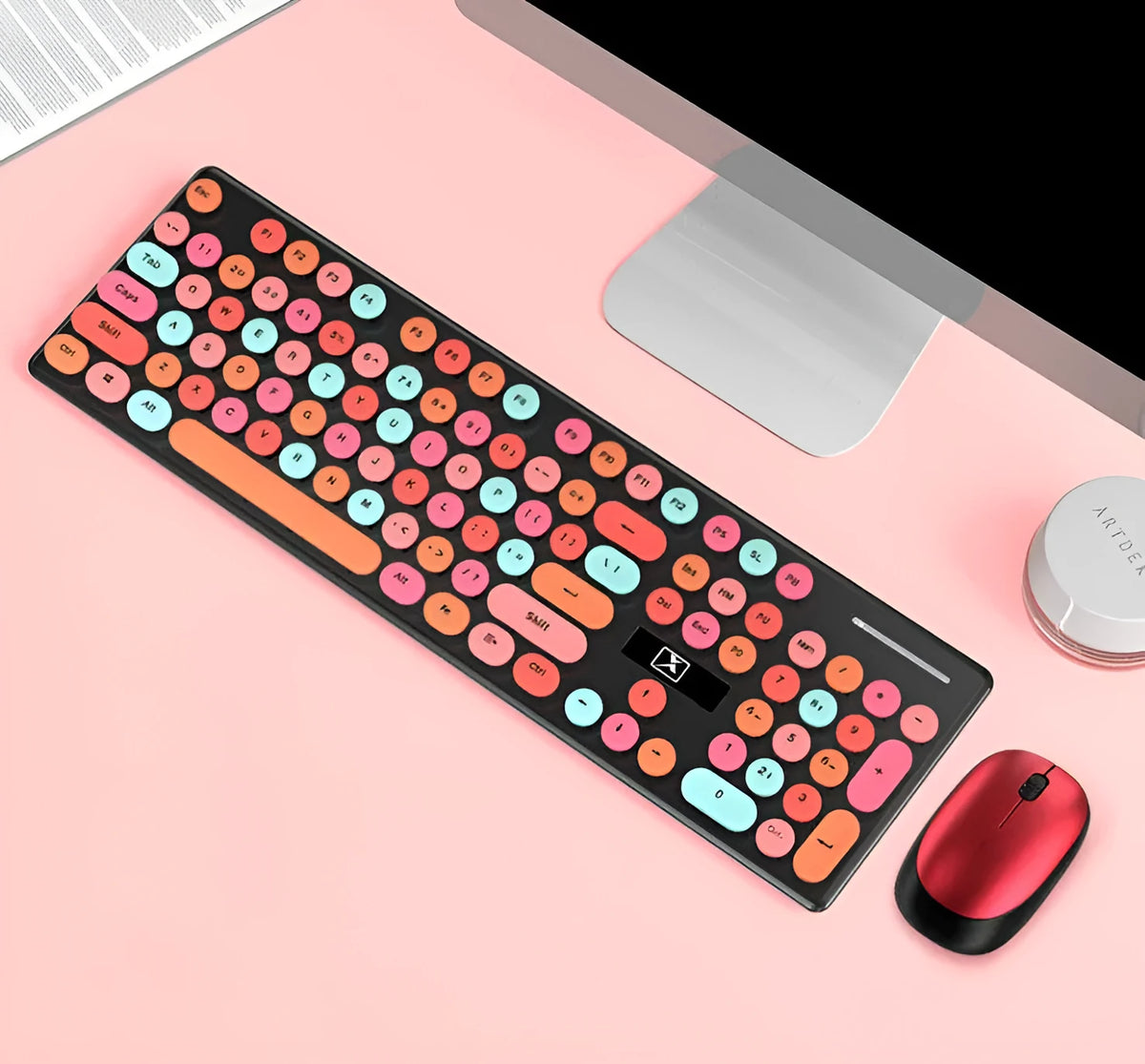 Vibrant yellow wireless keyboard and mouse set on a desk, showing backlit keys and USB receiver.
