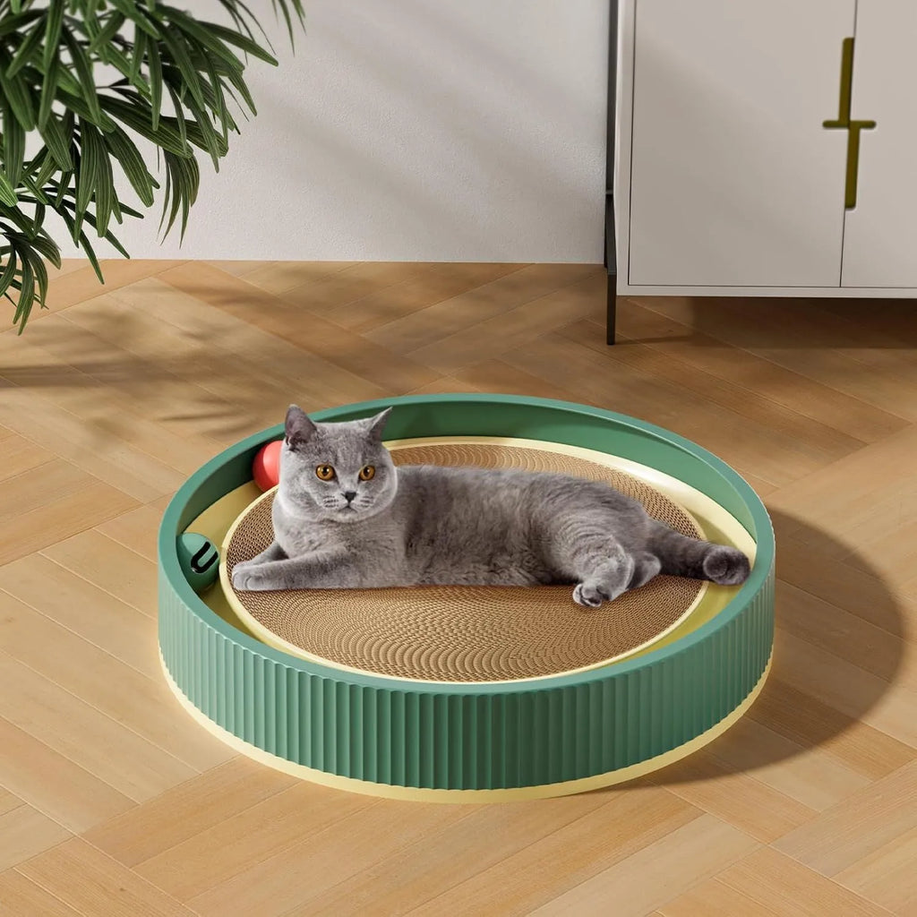Large green cat scratching board with moving ball toys and a refillable cardboard core.