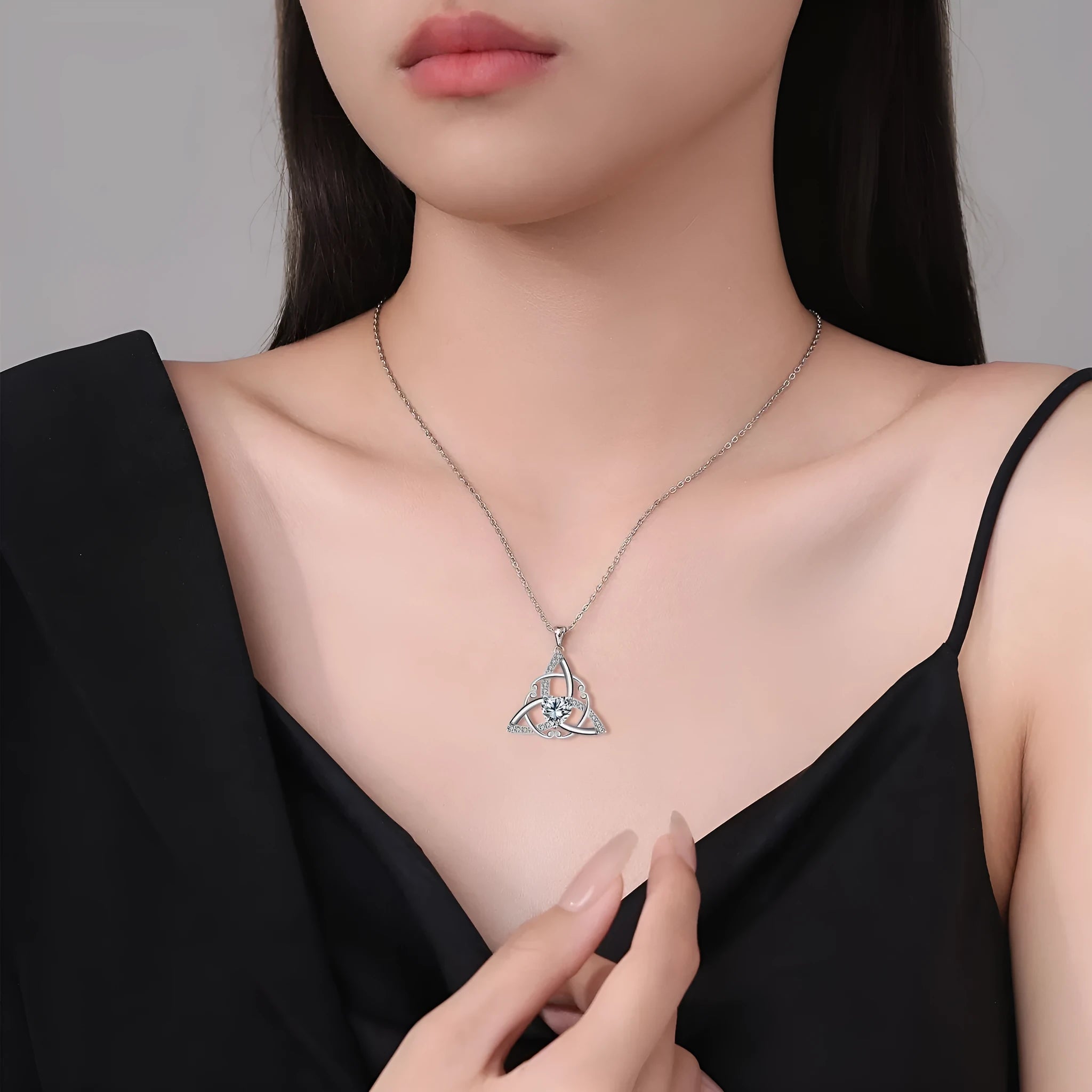 Geometric Celtic knot copper necklace for women showing electroplated finish in available colour options