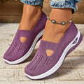 Low-top women's casual mesh shoes with a T-strap, in a selection of solid colours on a soft PVC sole.