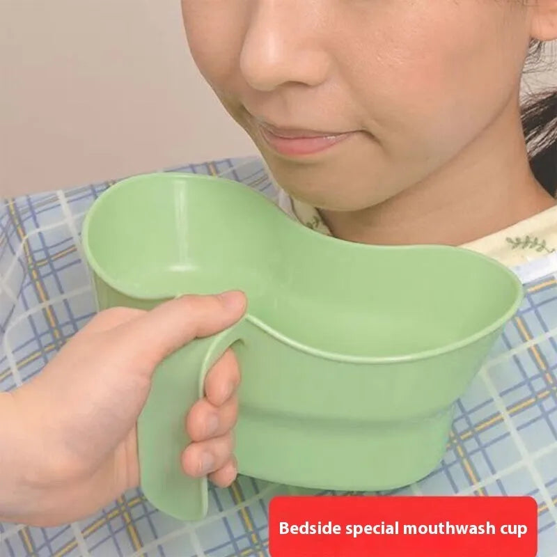 Green plastic elderly care gargle cup with a spout for bedridden patients