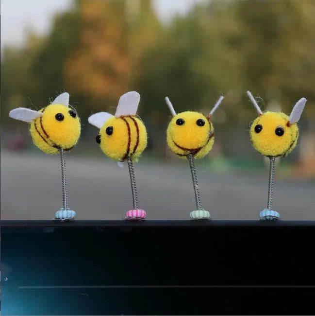 Swing Spring Bee car decoration ornament with cartoon design measuring 3x3 cm