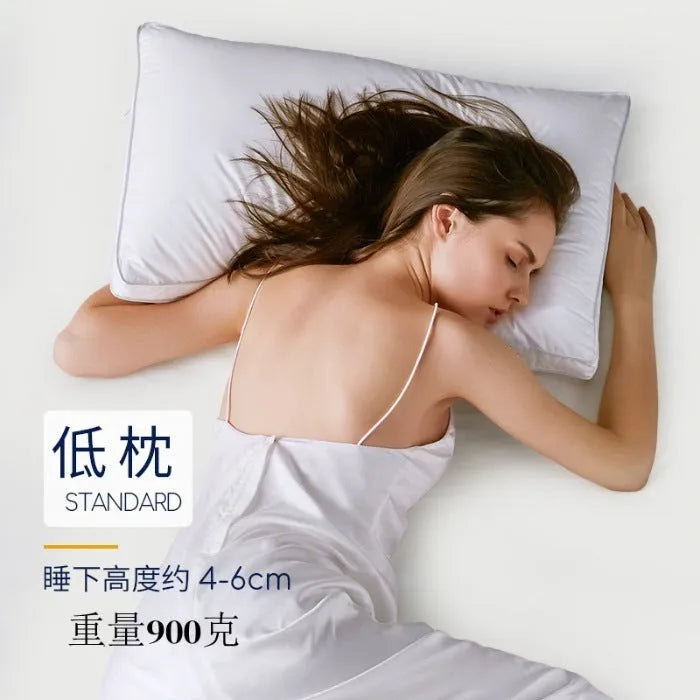 White cotton satin stripe pillow with feather and cotton filling, shown in low, medium, and high loft options.