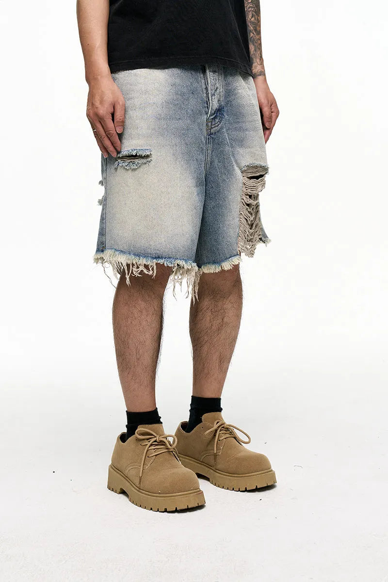Light blue retro washed denim shorts for men with baggy wide-leg cut and mid-waist design