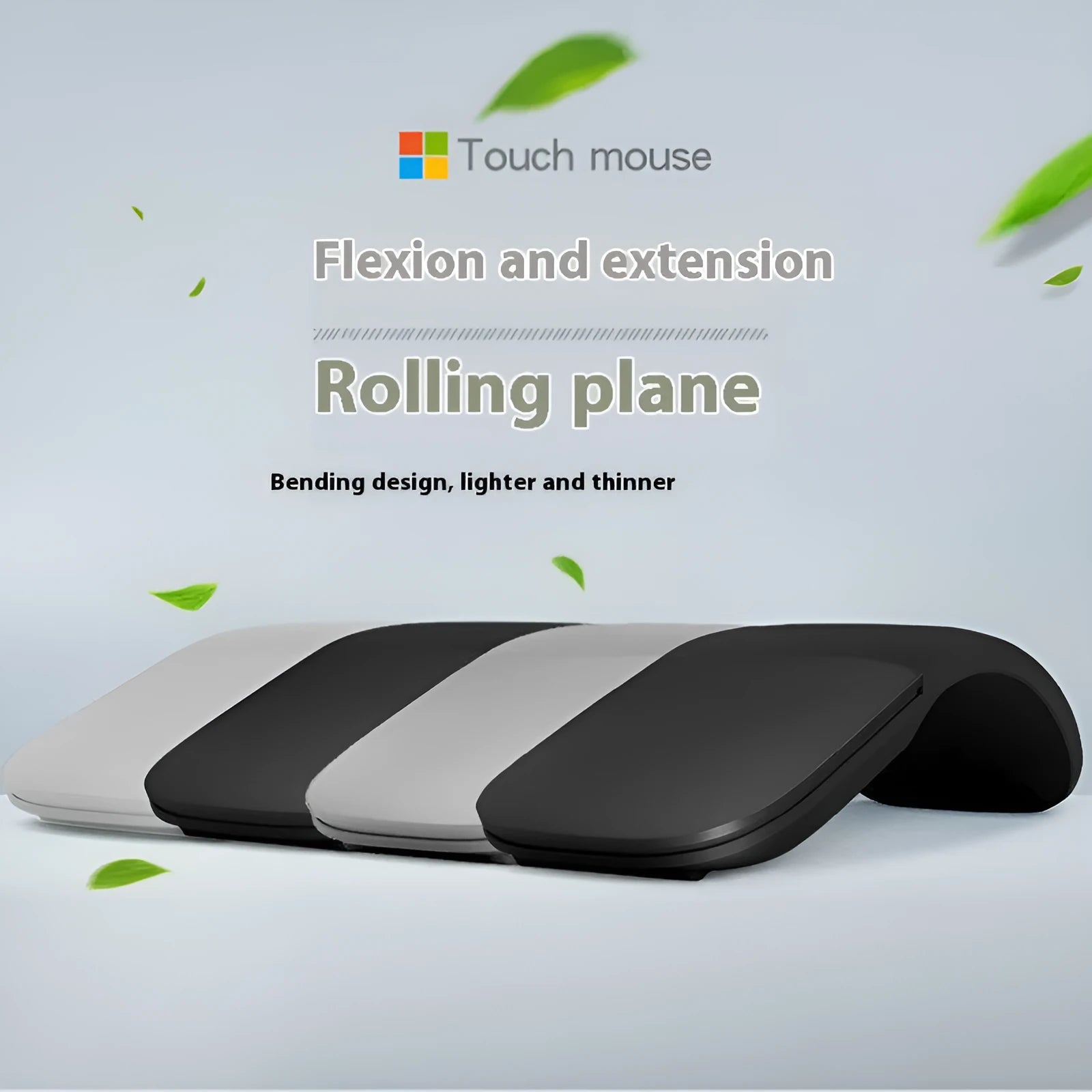 A closed black folding Bluetooth wireless mouse showing its compact size next to a laptop.