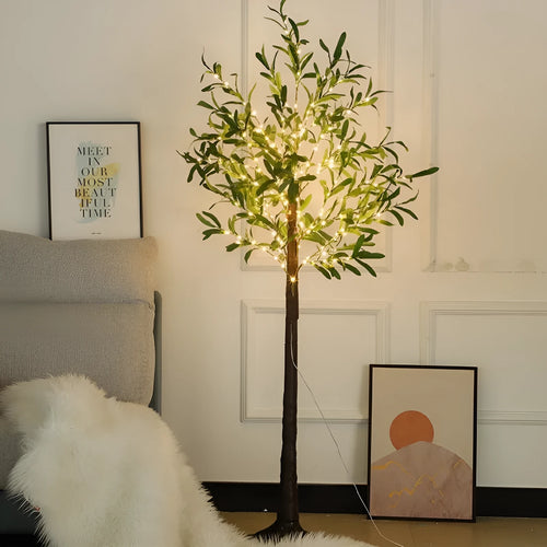 1.8 metre tall artificial olive leaf tree lamp with warm white LED lights illuminated in garden setting