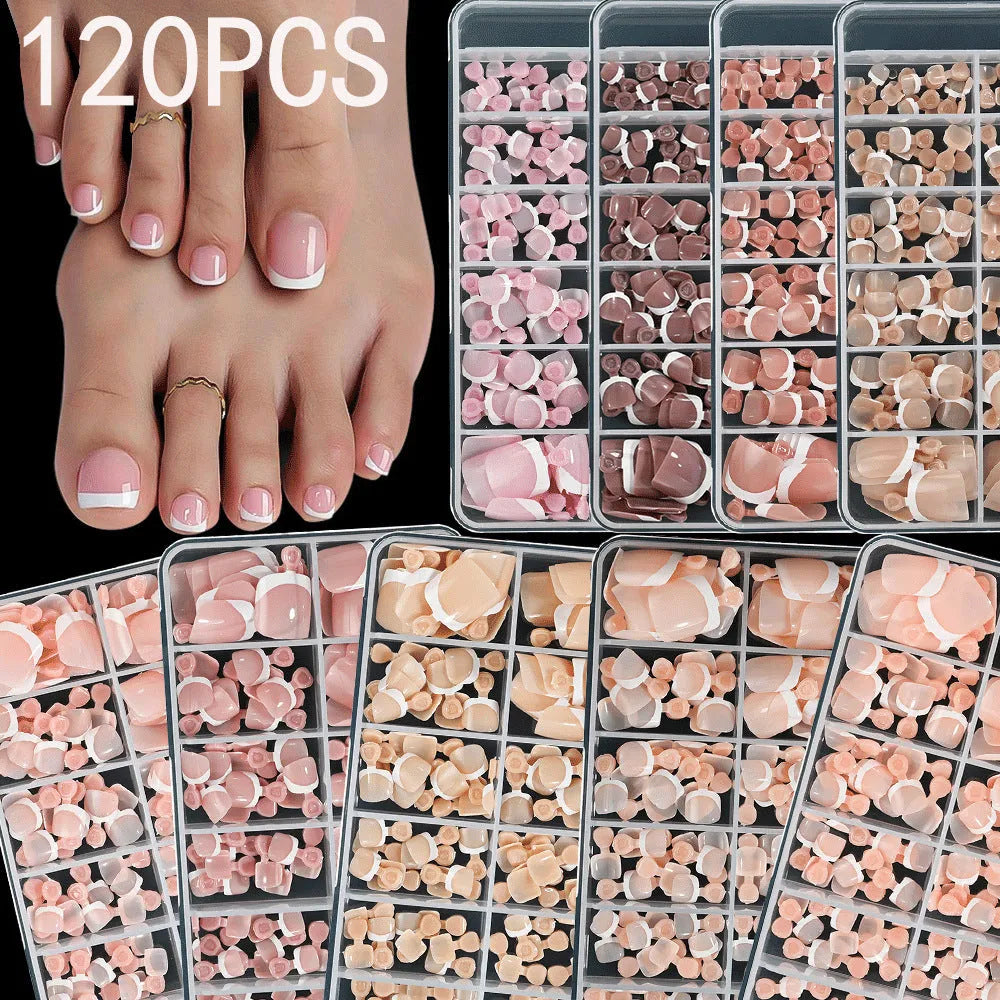 120 piece box of square short French style artificial toe nails with white tips on nude base.