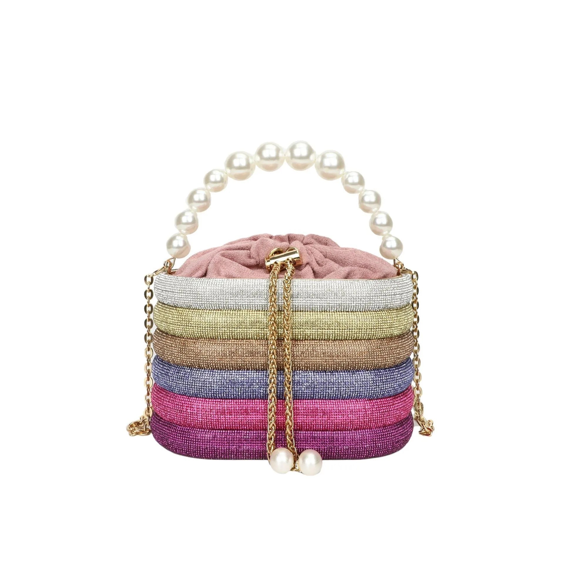 Soft round retro-style women's crossbody bag with bead details in gold colour.