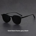 Retro round oval frame sunglasses with polarised grey lenses shown in multiple colour options.
