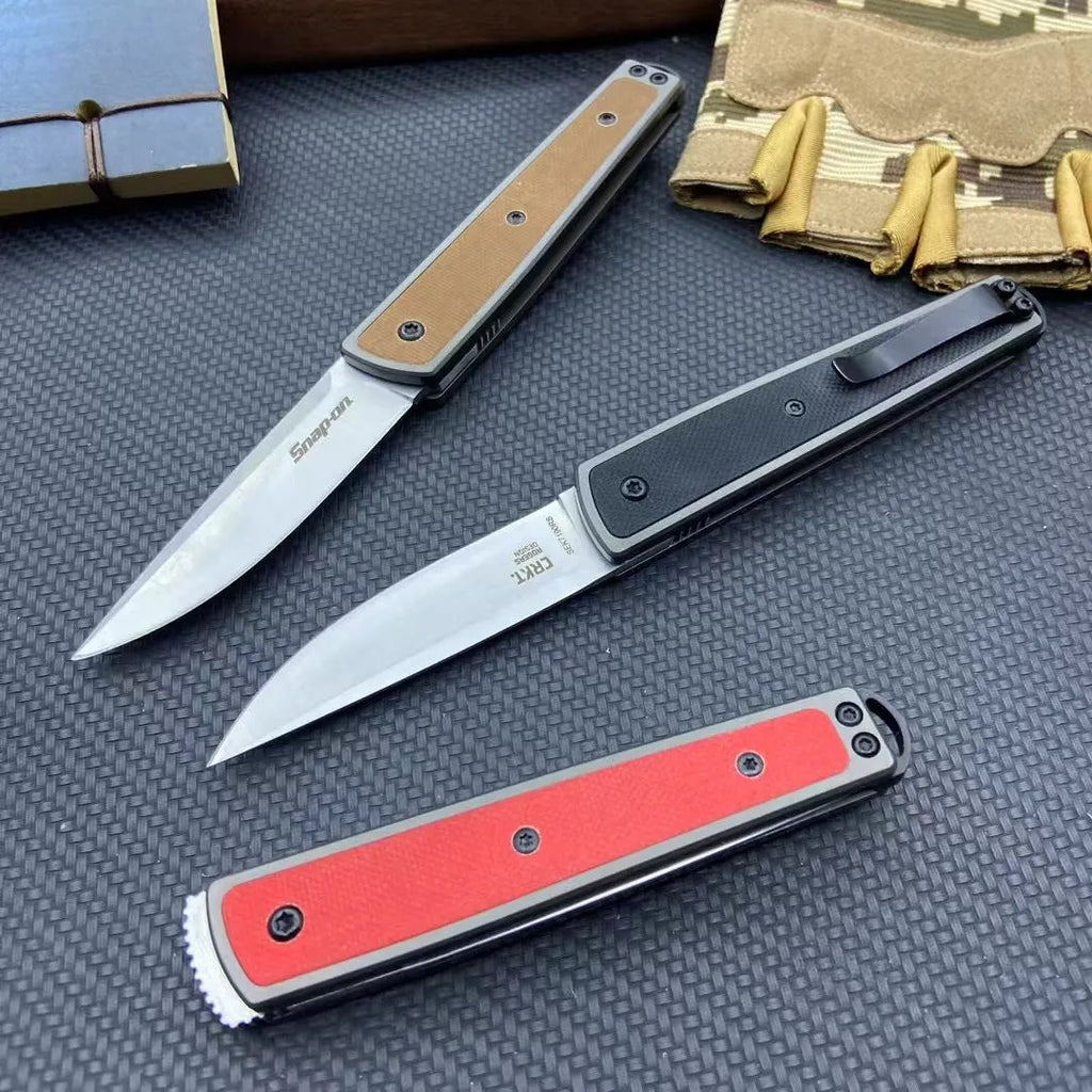 Folding fruit knife with stainless steel blade in black, brown, or red colour options