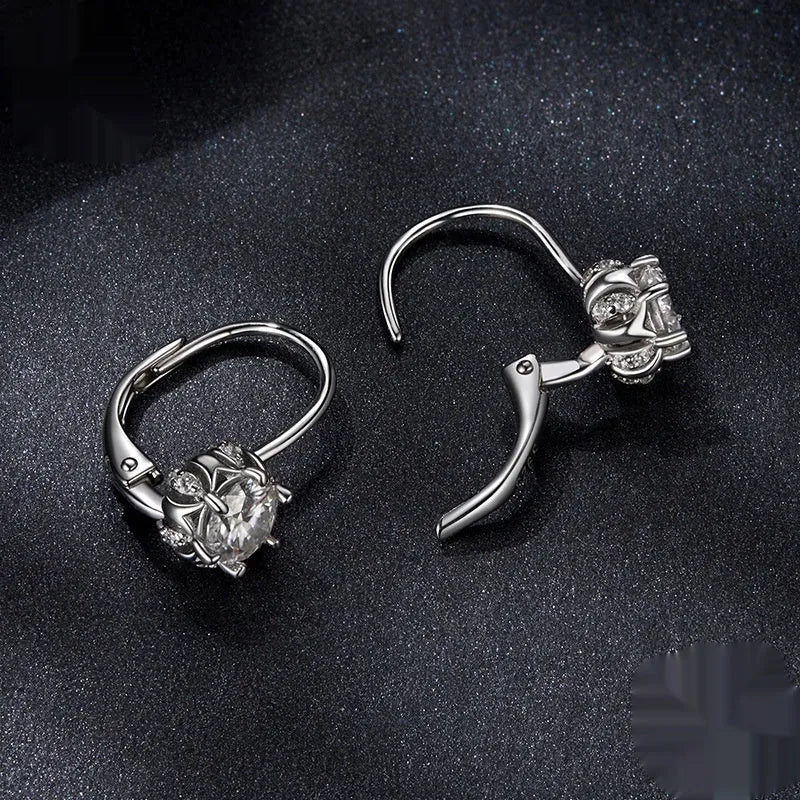 Flower bud design clip earrings in sterling silver with moissanite stone and white gold plating