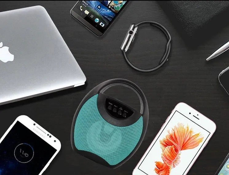 Black portable Bluetooth speaker with USB port and SD card slot.
