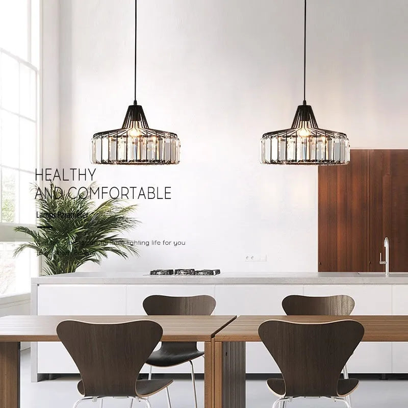 Modern black and crystal LED chandelier ceiling lamp with colour changing lights.