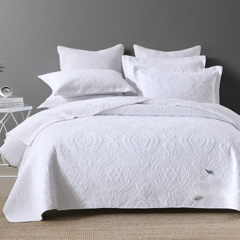 Pure cotton bedding set with damascus pattern showing embroidery details and quilted finish on bed