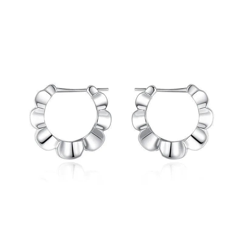 Pair of sterling silver geometric earrings with round elements and electroplated finish
