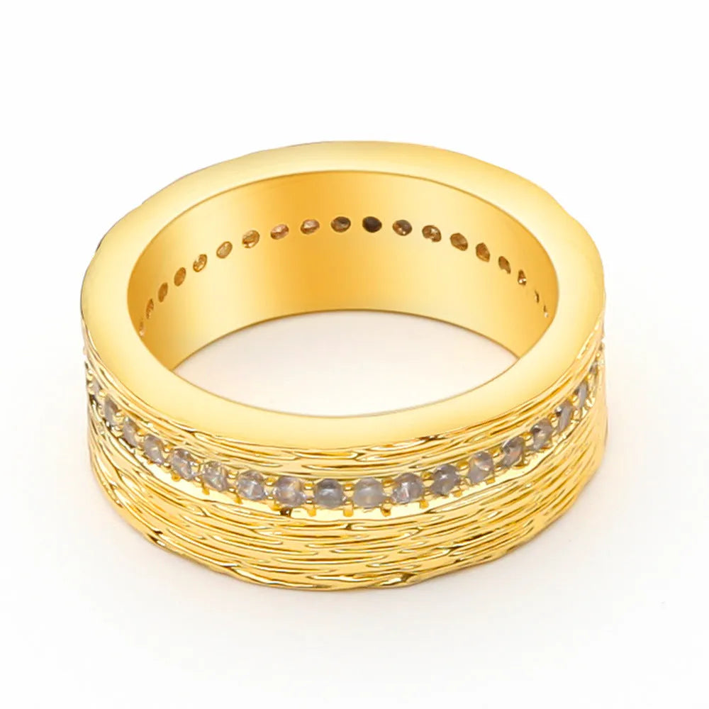 Geometric gold-coloured zircon ring for women showing detailed design and electroplated finish