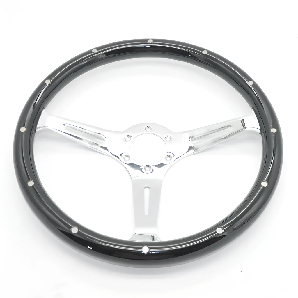 Black classic car steering wheel with electroplated finish on peach wood