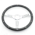 Black classic car steering wheel with electroplated finish on peach wood