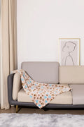 Blue cartoon dog print double-sided flannel pet blanket laid flat.