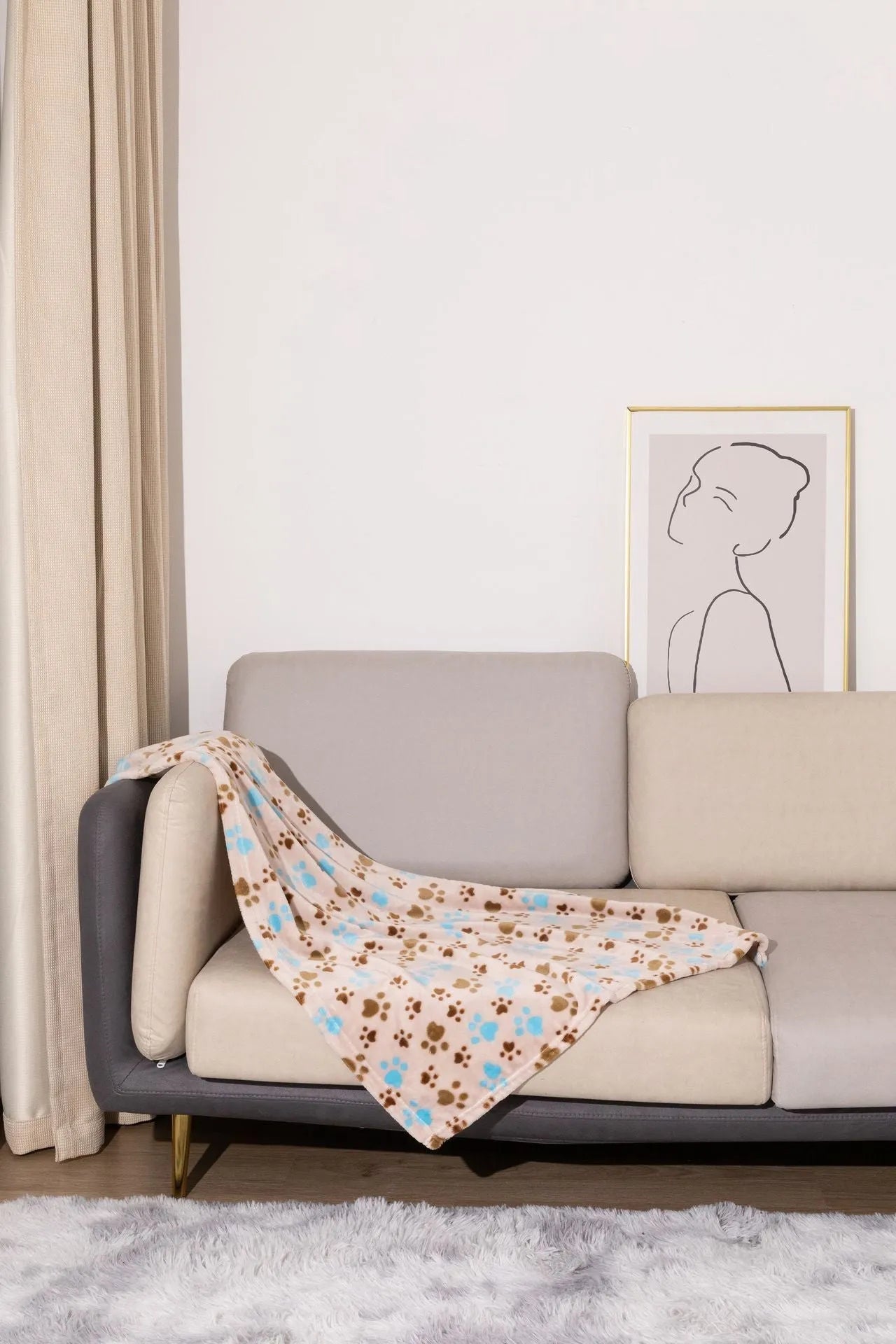 Blue cartoon dog print double-sided flannel pet blanket laid flat.