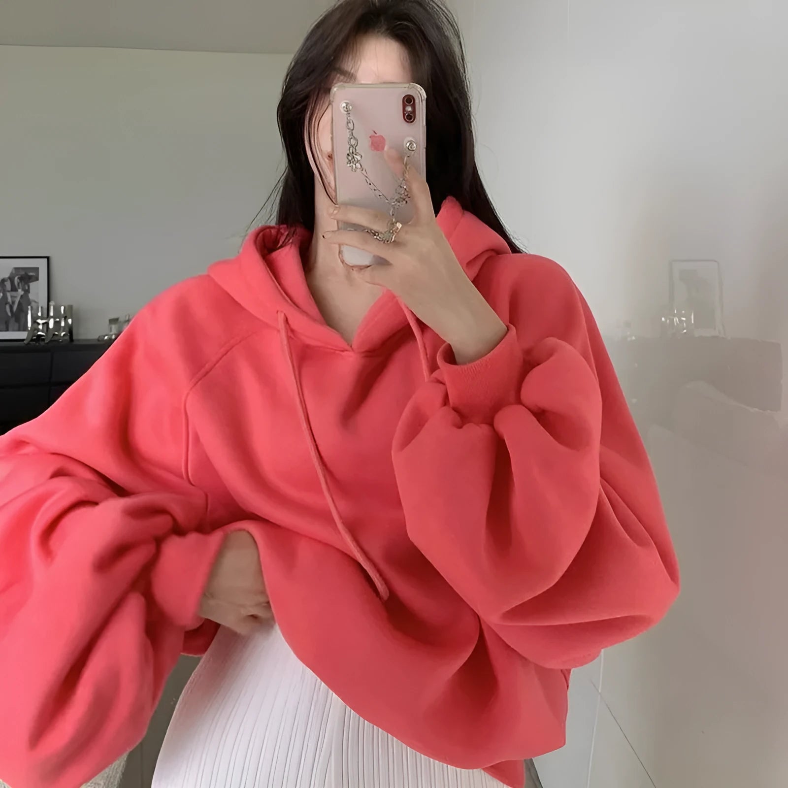 Watermelon red sleeveless Mulberry Silk hooded sweater on a hanger, showing loose fit and solid colour.