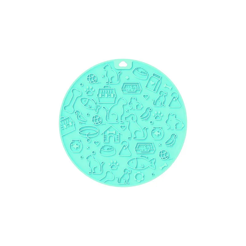 Round silicone pet licking mat in mintcream colour with textured surface and non-slip base