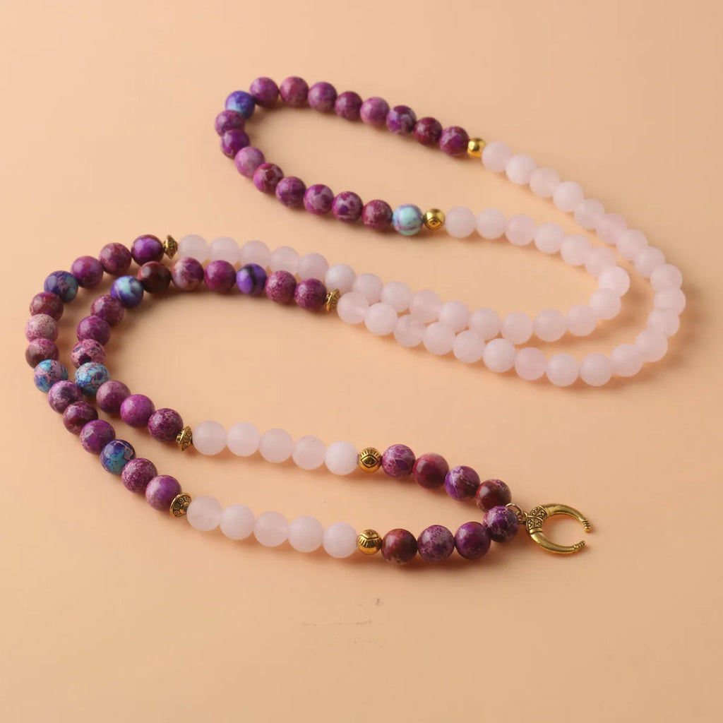 Pink crystal Emperor Stone beads pendant necklace on model, showing round beads and adjustable chain