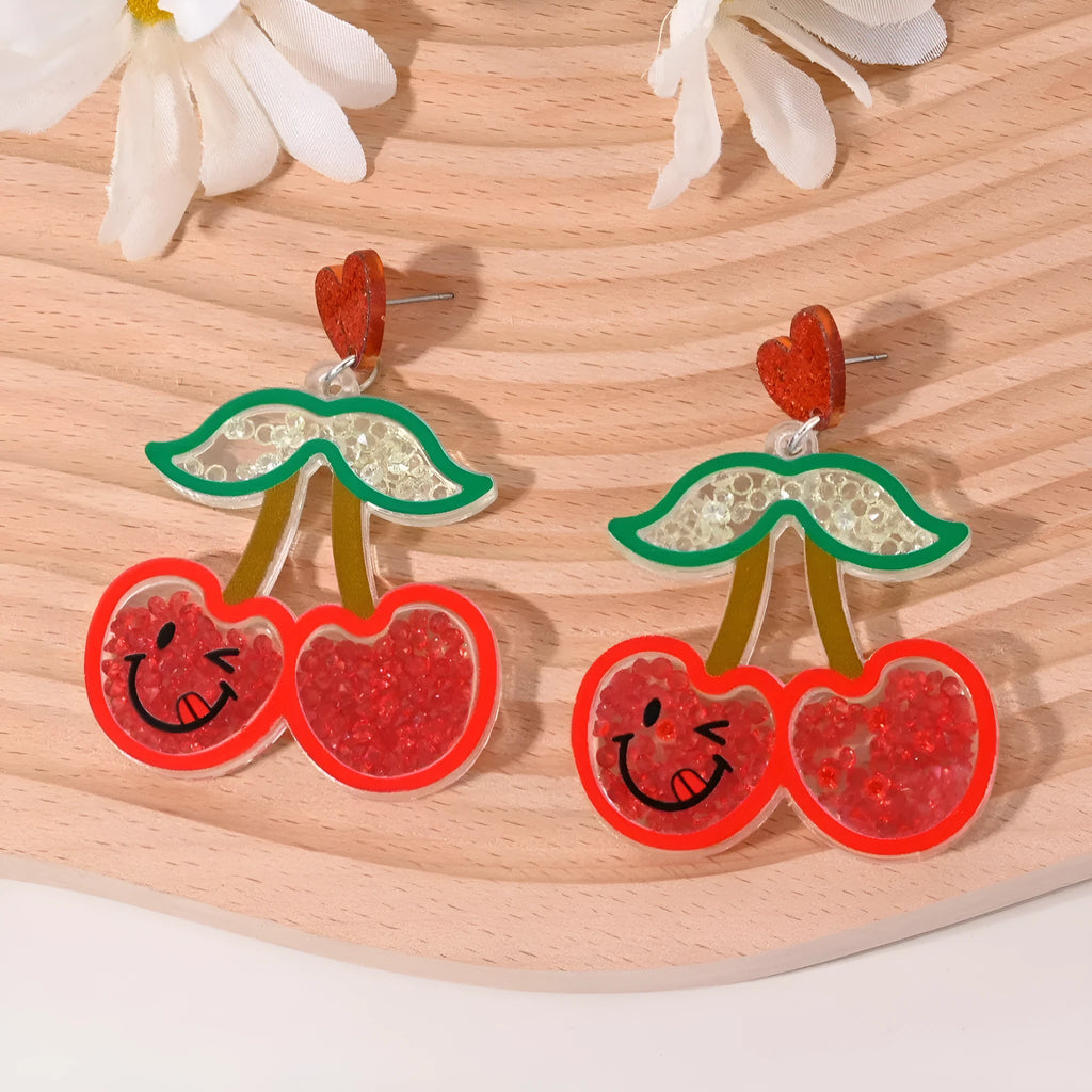 Colourful acrylic earrings shaped like cherry, strawberry, watermelon, pineapple, coconut tree, cake, and ice cream